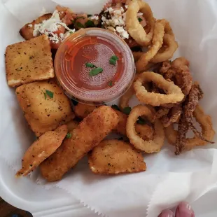Appetizer sampler.  It was amazing!!  My husband said the calamari was cooked perfectly.