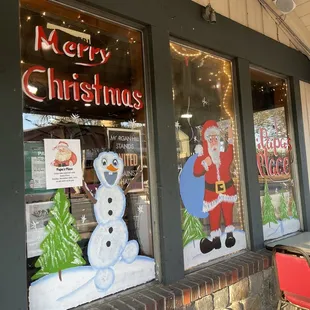 Whimsical Christmas Decorations outside, they have a few outdoor tables