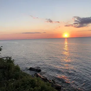 a sunset over the ocean