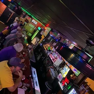 patrons at the bar