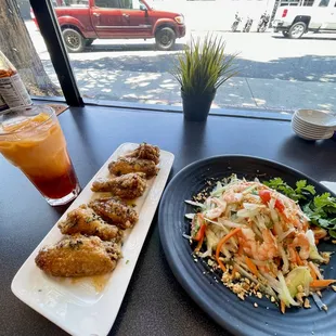 Thai tea, sticky wings, shrimp papaya salad