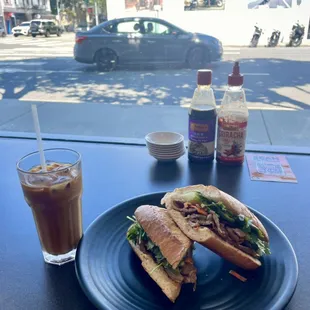 Grilled pork banh mi with ice coffee