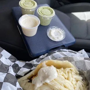 Chicken Arepa Pabellon Chicken w/ garlic &amp; cilantro sauces on the side