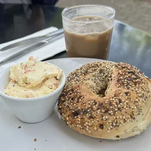Toasted bagel with veggie cream cheese and yummy iced blackberry mocha
