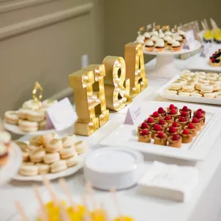 Dessert Table (fruit tarts, mini cupcakes, macarons, shots, etc.)