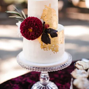 a wedding cake with flowers