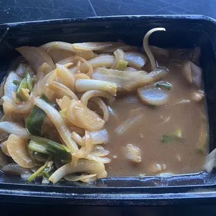 a bowl of noodles and broccoli