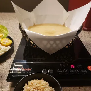a bowl of rice and a bowl of soup