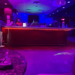 people sitting at a bar