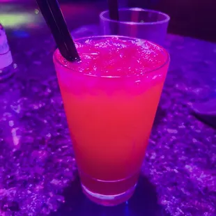 a drink with a straw in it