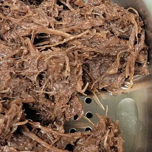 After emptying the cup into the strainer.