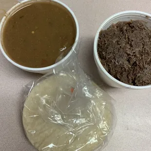 One pound of all meat barbacoa and an order of beans with 12 tortillas