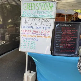 a sign for a green store