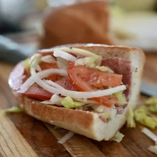 a sandwich on a cutting board