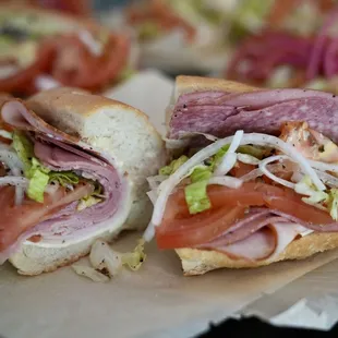 a sandwich with meat and vegetables