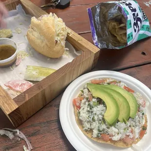 Italian Hoagie. Ceviche from the food truck next to them.