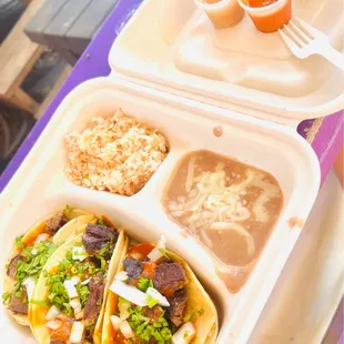 Lengua tacos with beans and rice