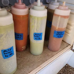 Inside the neat little self serve hot sauce fridge