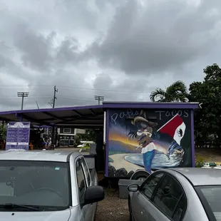 Front of food truck facing parking lot.