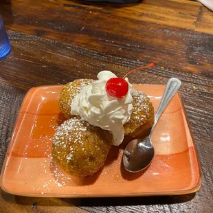 Fried ice cream! The fried part was a little too sweet, but over all it&apos;s a delicious dessert!