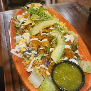 Baja burrito bowl with chicken side of salsa Verde and Chipotle ranch