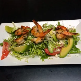Grilled Shrimp Salad with frisee, tomatoes, nopal, avocado, queso fresco with a lemon shallot dressing