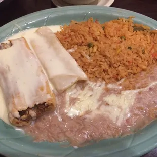 Tamale and enchilada combo