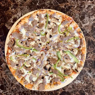 CHEESE STEAK! mozzarella, onions, mushroom, steak and peppers.