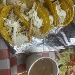 Pollo mini tacos with sour cream + charro beans $10