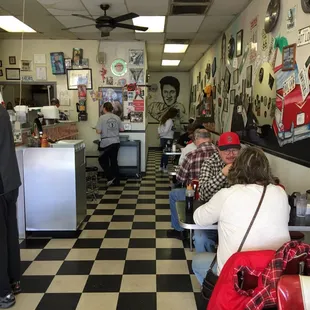 These are pictures of the inside of the restaurant and of the menu.