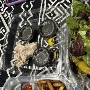 a salad and fries