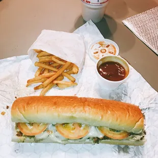 Philly works with tomato, fries and gravy