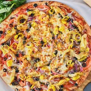 #22 The Veggie: Mushroom, Roma Tomatoes, Red Onion, Banana Pepper, Garlic, Black Olive, Artichoke hearts- on a Red sauce based