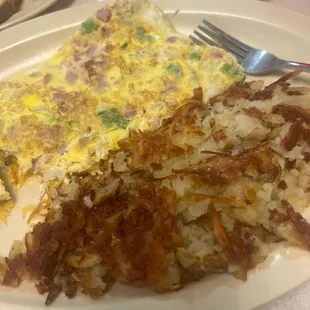 Enjoying this Western Omelette with sourdough toast and hash browns.