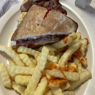 Meat lover&apos;s sandwich with fries