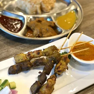 Mixed skewers and curry chicken roti