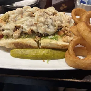 Chicken Cheesesteak with a side of onion rings