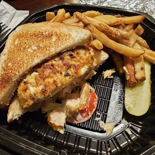 Seafood Club sandwich with fries