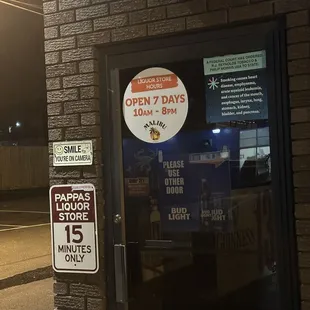 a pizza shop with a sign on the door