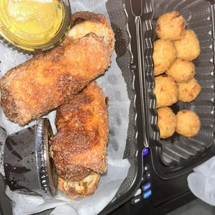 Seafood egg rolls and hush puppies. Not the best, unfortunately.