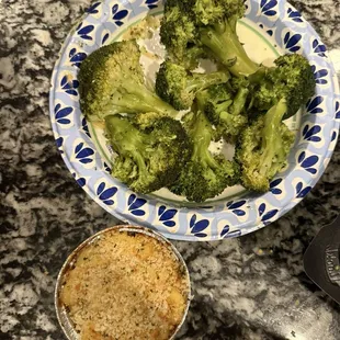 Condiment cup full of mac and cheese and a ridiculous amount of broccoli both were to be sides but the ratio was extremely off