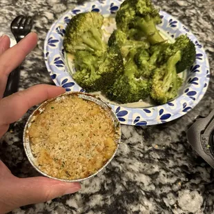 Condiment cup full of mac and cheese and a ridiculous amount of broccoli both were to be sides but the ratio was extremely off