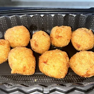 Hush puppies...decent tasting batter, but not hot at all and semi-raw inside.