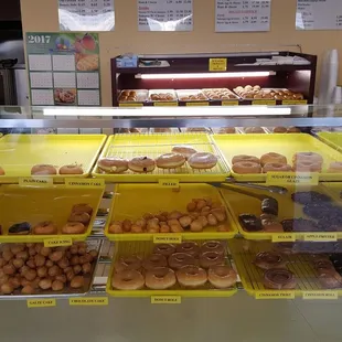 The donut selection up front with kolaches and breakfast sandwiches in back.