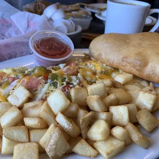 Omelette with papitas and a warm sopapilla