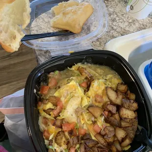 Huevos Rancheros (I dumped the potatoes on top) and the sopapilla on the side