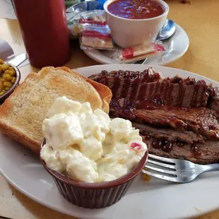 Beef brisket, potato salad,  sweet corn, and chili. Such a great meal!
