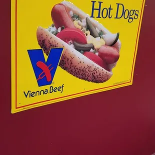 a hot dogs sign