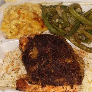 String beans macaroni and cheese stuffed salmon with crab meat over top of the rice