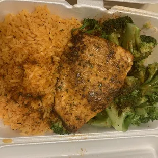 Salmon, orange rice and broccoli